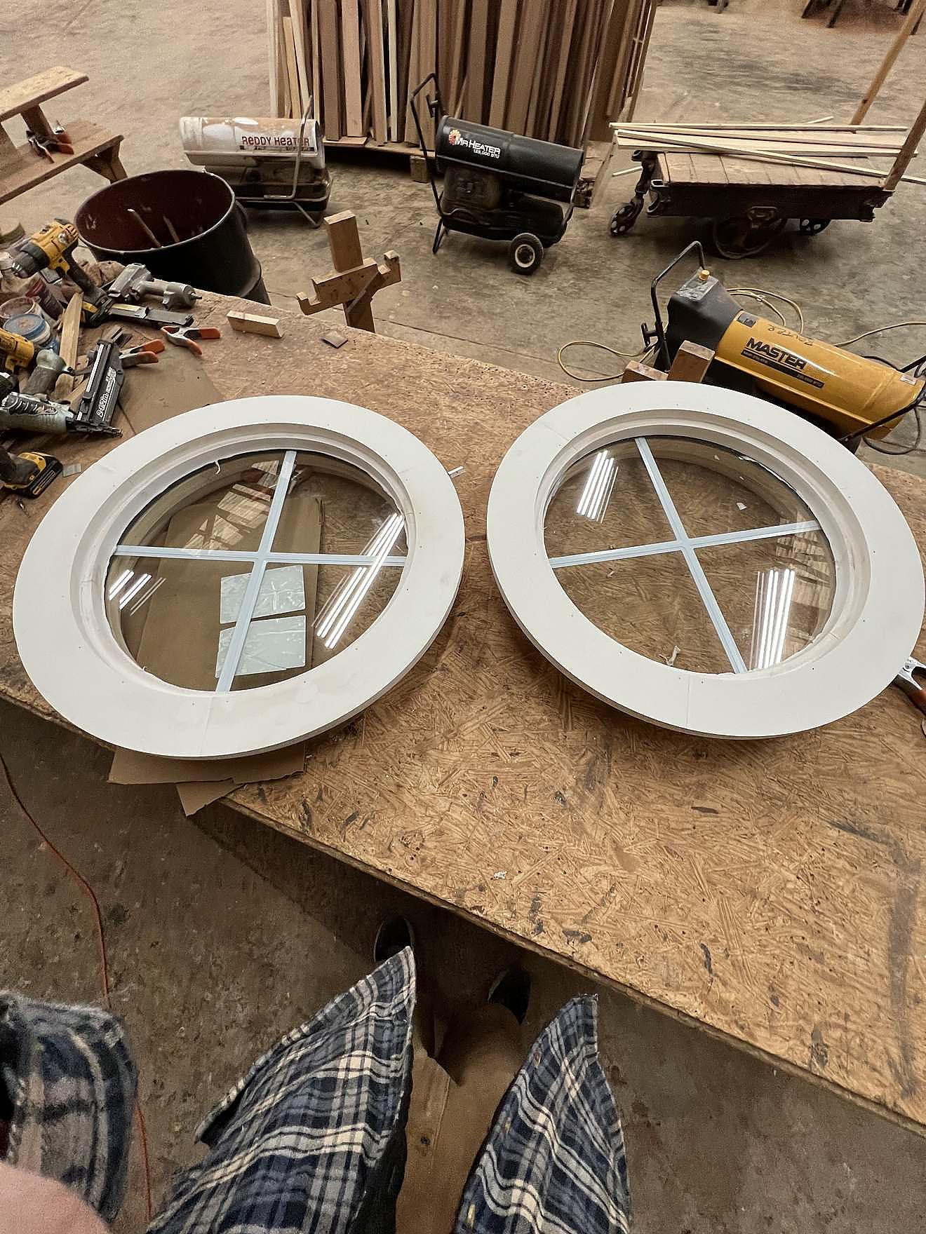 Pair of custom round porthole windows with cross muntins
